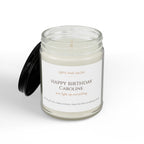 Her birthday candle label close-up — personalized name and message in warm copper serif typography